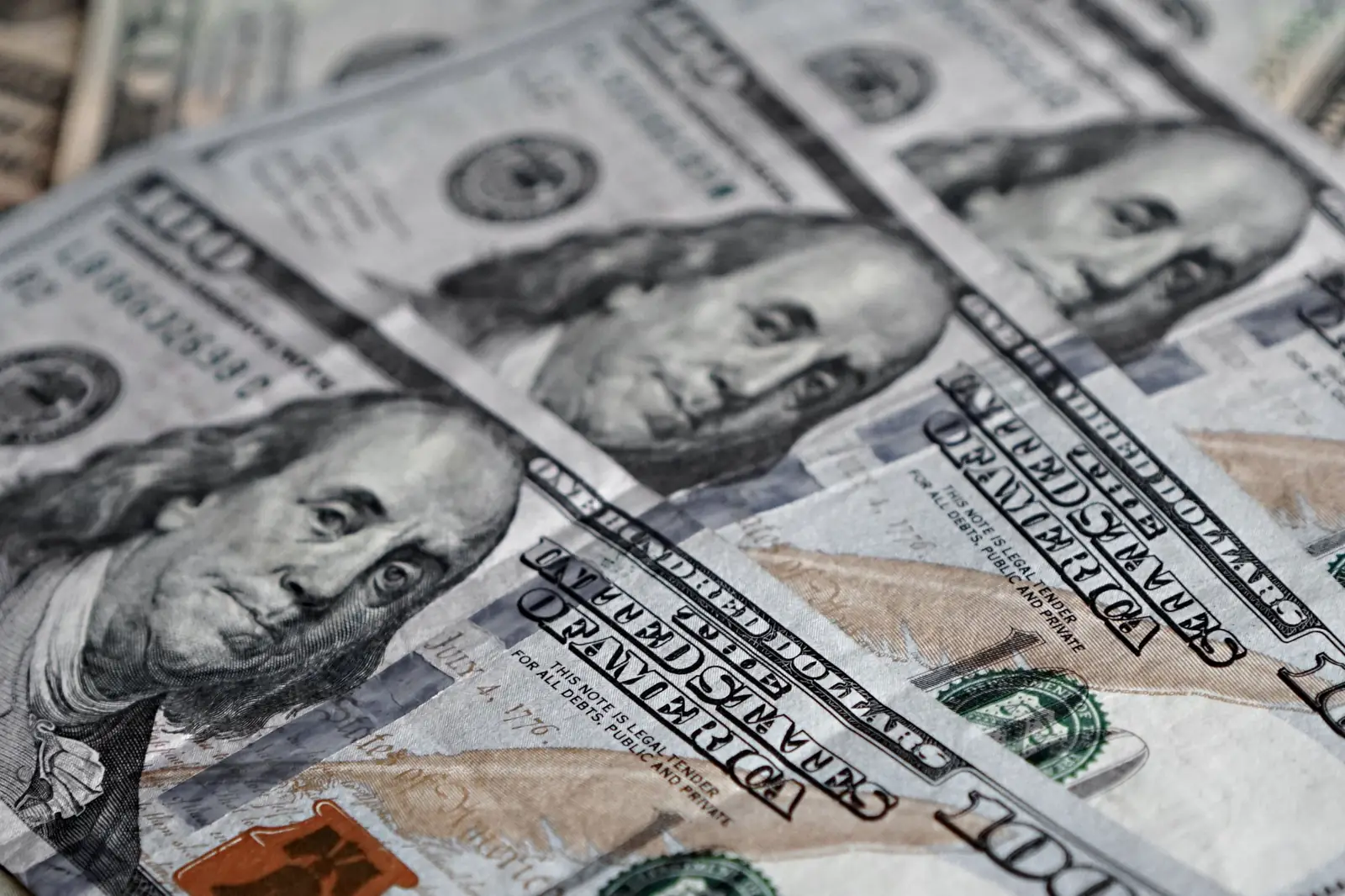 Hundred-dollar bills on a table