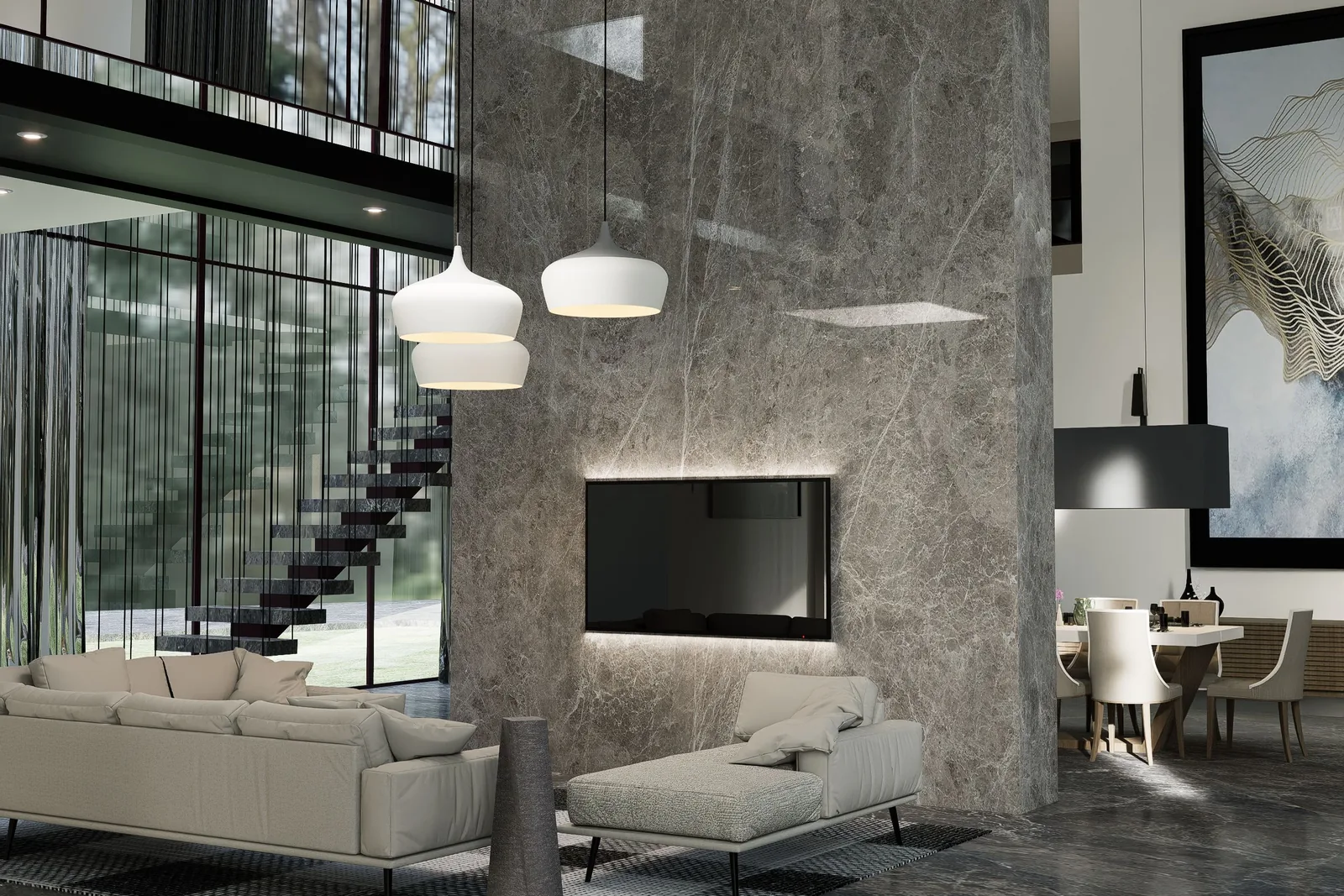 Double-height living room with a gray marble column, light sofas, white pendant lamps and a floating staircase